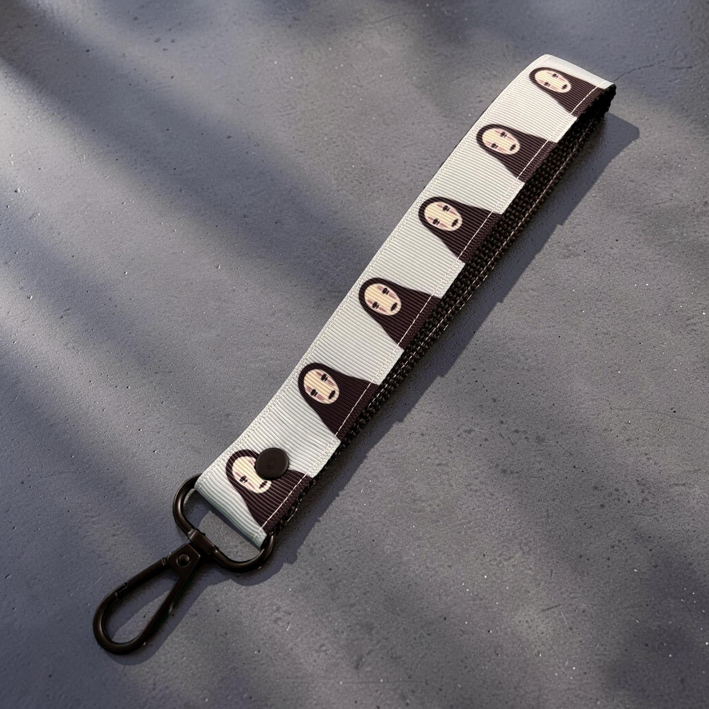 No Face Wristlet Strap