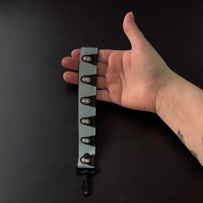 No Face Wristlet Strap